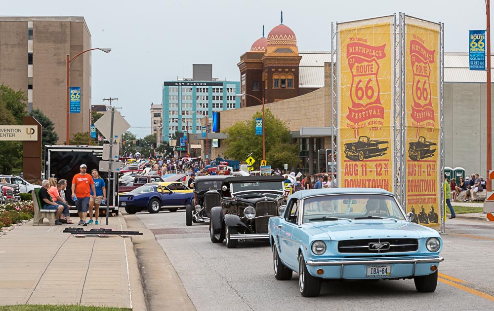 Classic cars driving down Route 66 in Springfield