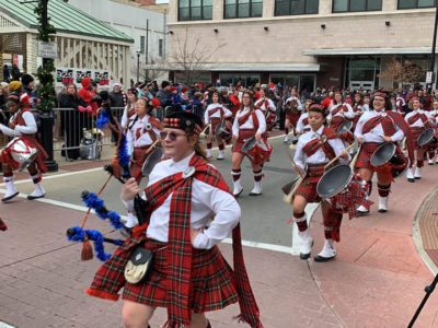The Central Kilties Drum & Bugle Corps performs during the 2019 Downtown Springfield Christmas Parade