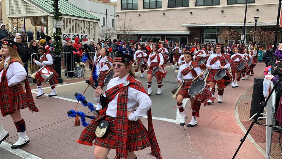 The Central Kilties Drum & Bugle Corps performs during the 2019 Downtown Springfield Christmas Parade