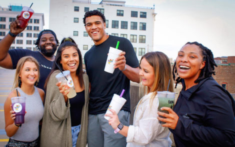 Customers enjoying drinks from Downtown Health Bar